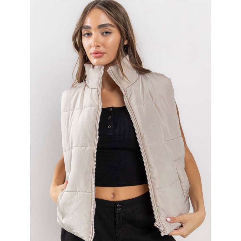 Puffer vest with pockets in light taupe
